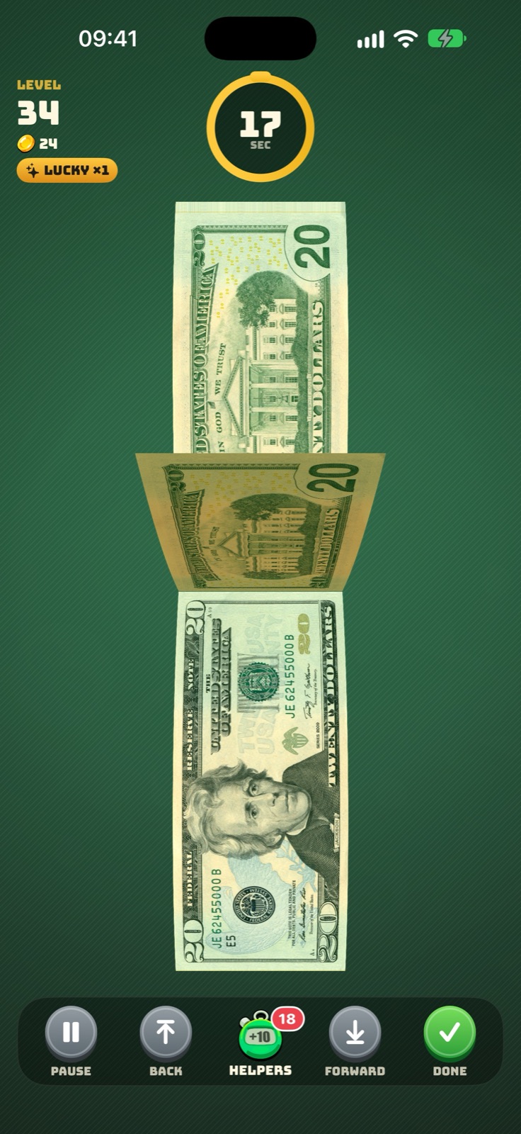 Counting a stack of $20 bills with a lucky golden bill